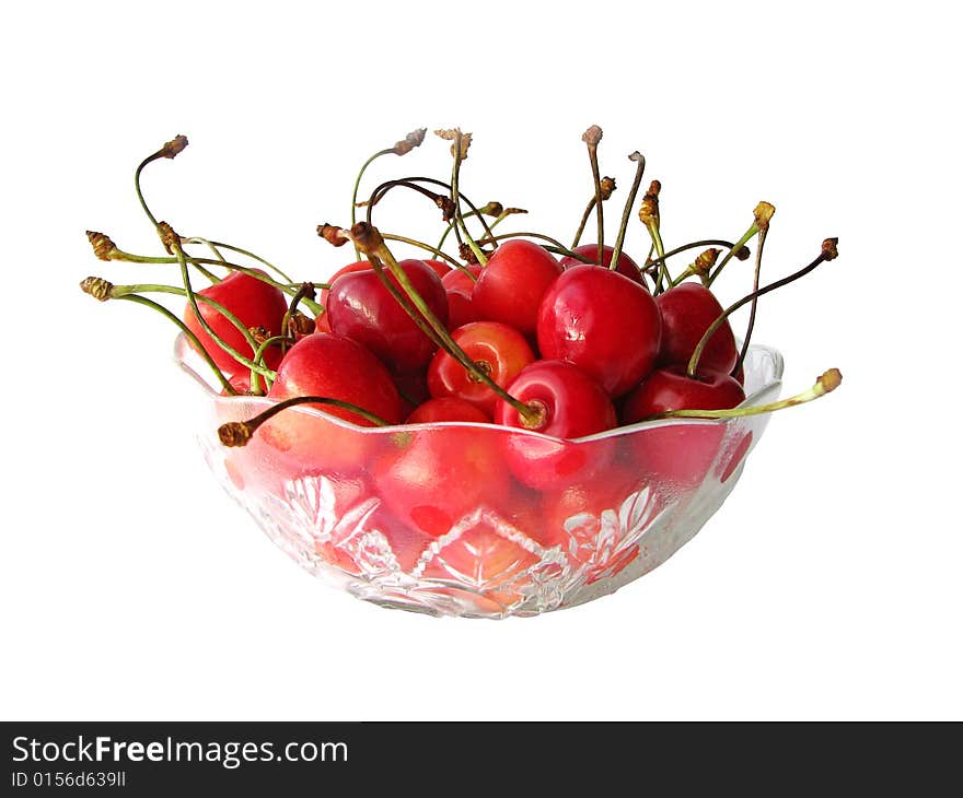 Isolated cherries in glass bowl