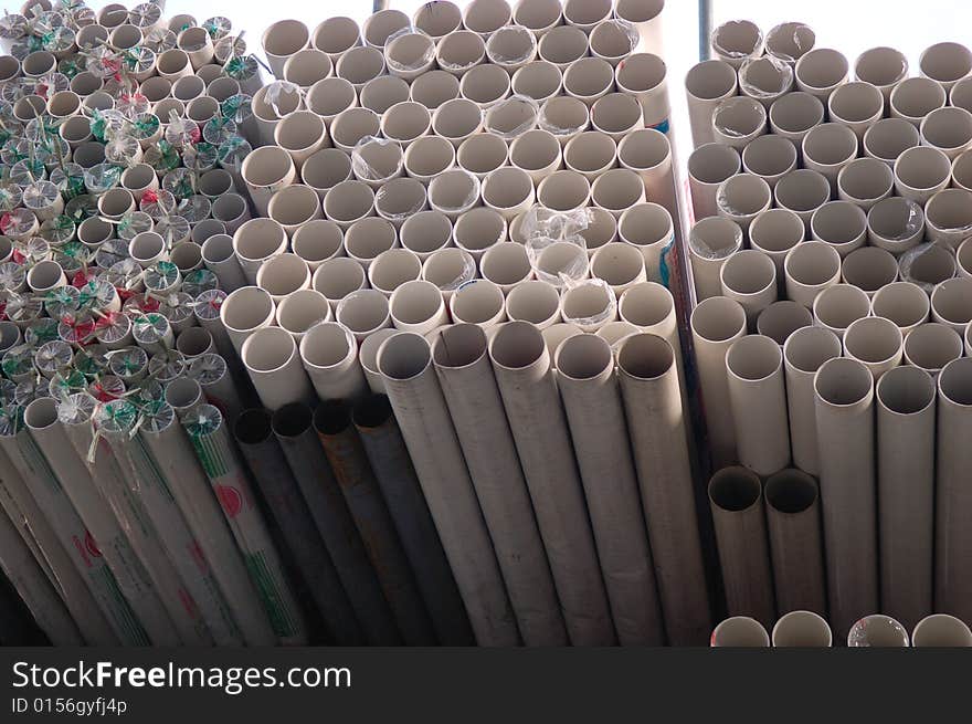 Drainage pipes stacked at a construction site