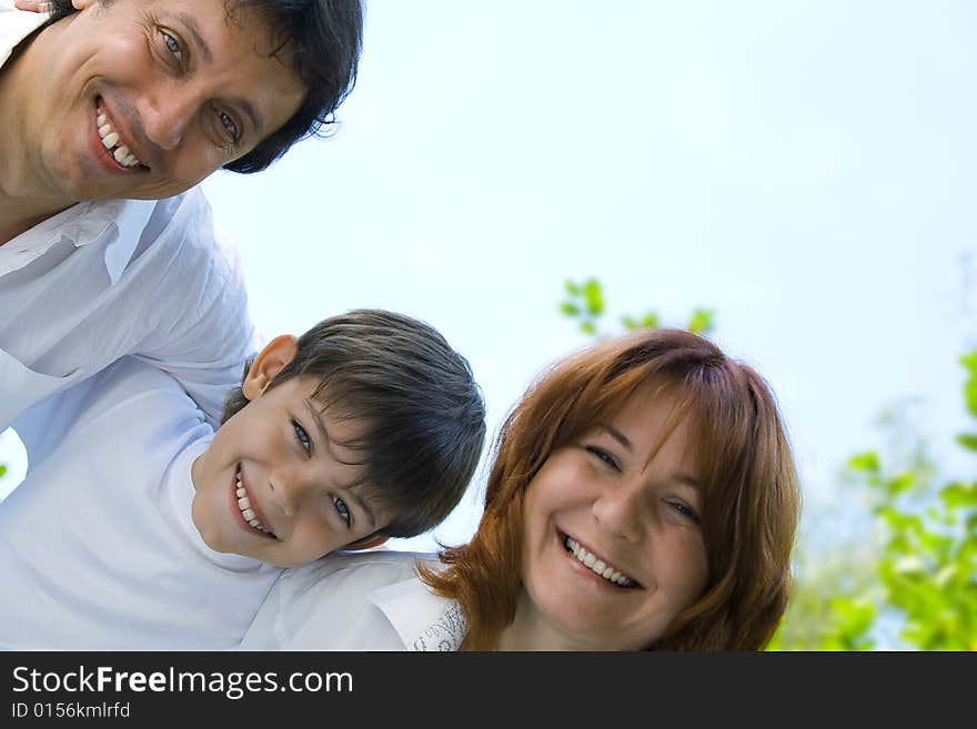 Portrait of young happy family getting together. Portrait of young happy family getting together