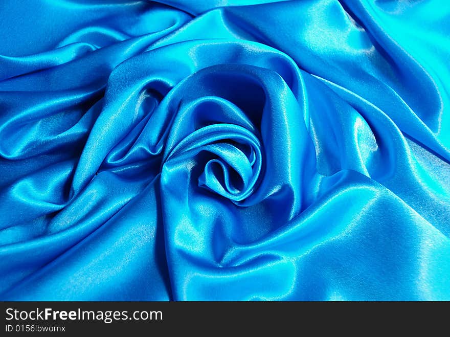 Blue satin with a folds