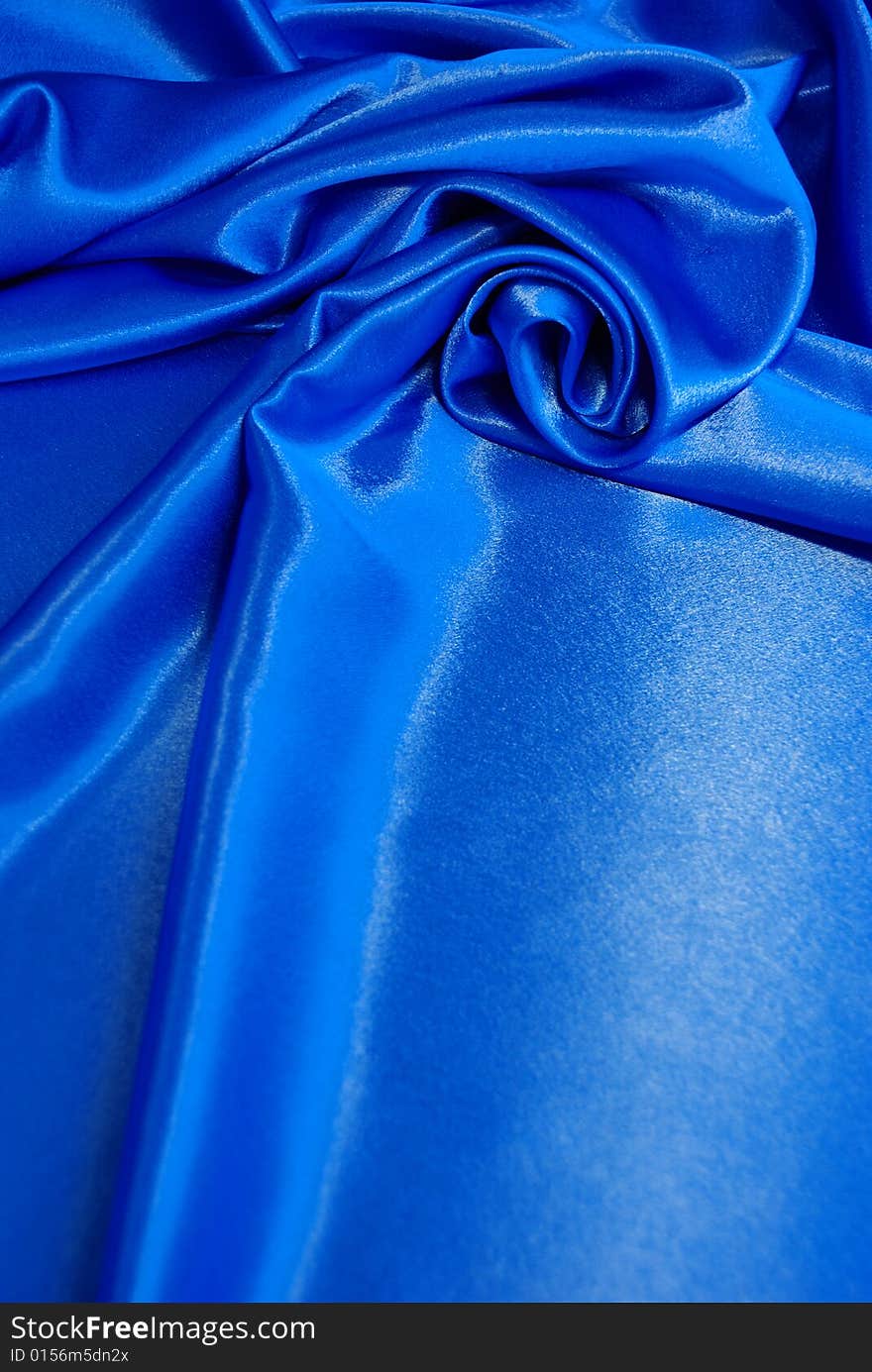 Blue satin with a folds