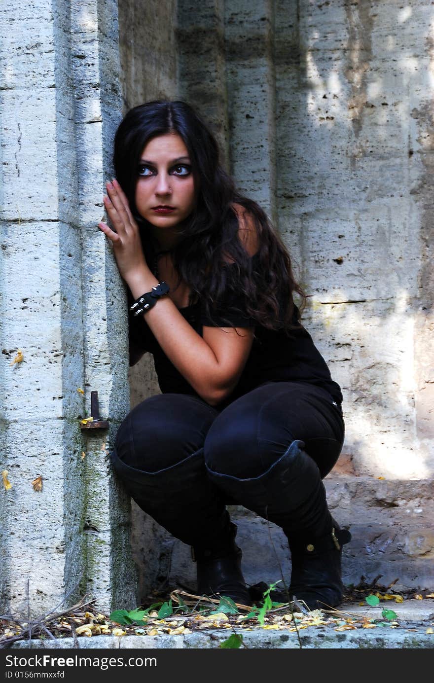 The thoughtful girl in a chapel. The thoughtful girl in a chapel