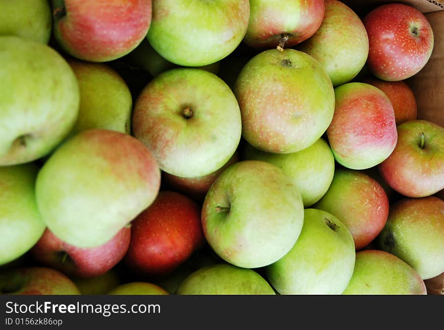 A basket of apples for sale at the farmers market