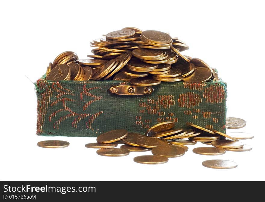 Riches, gold coins in a chest isolated on white