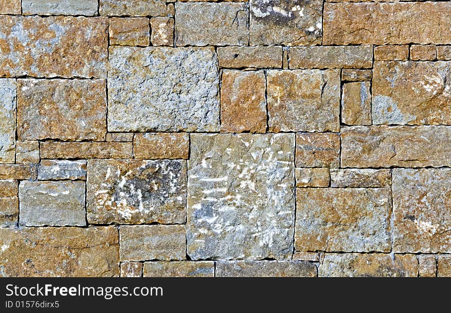 Detail from a stone fence wall for use as a texture or background