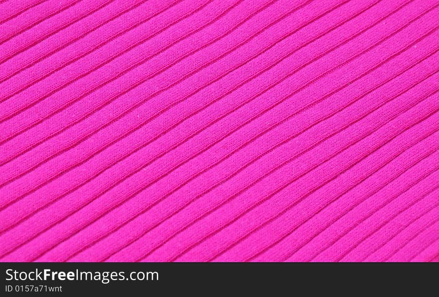 Close up of a pretty pink knit, an ideal background. Close up of a pretty pink knit, an ideal background