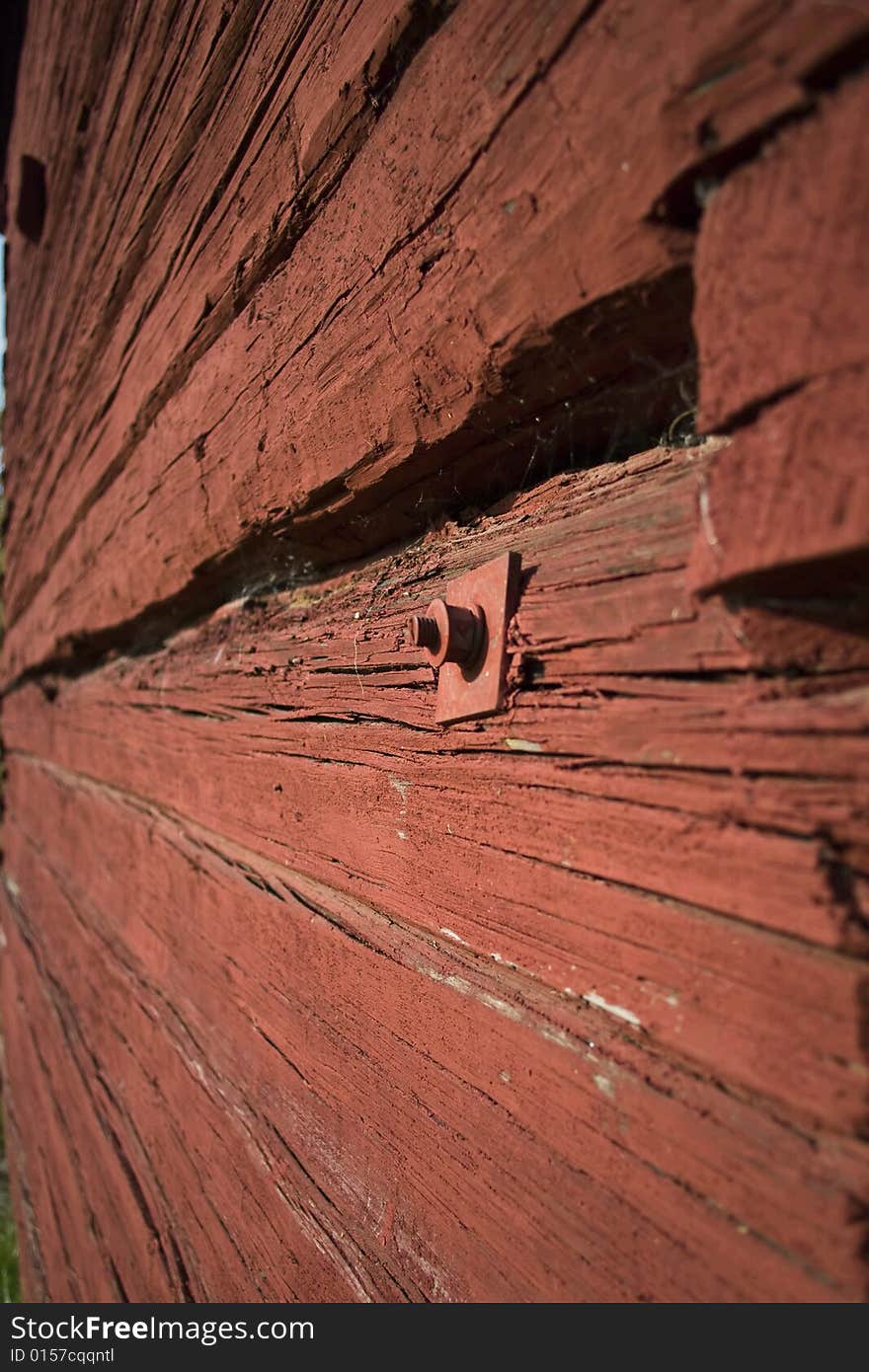 A red timberwall of barn in Lulea