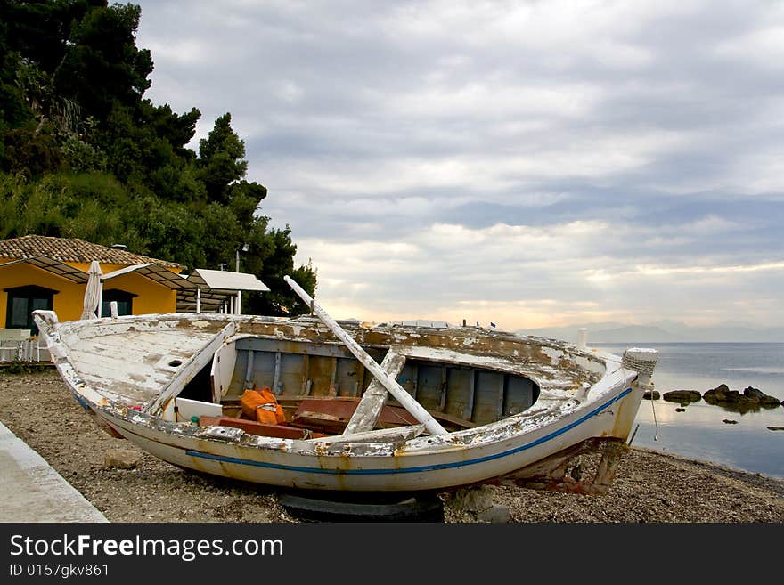 Old wreckage of a traditional greek fishing boat. Old wreckage of a traditional greek fishing boat