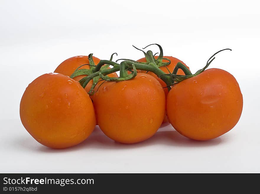 Juicy Tomatoes isolated over white. Juicy Tomatoes isolated over white