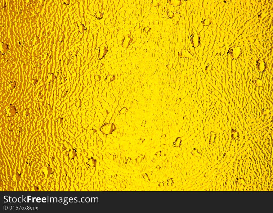 Water drops on the textured orange glass