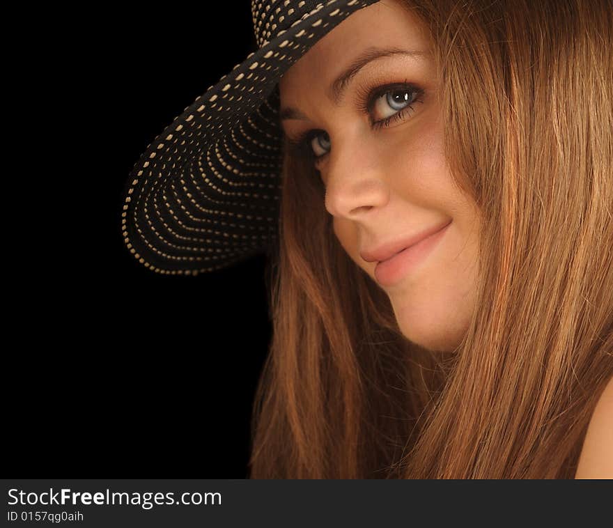 Beautiful Image of a Woman In a Hat on Black. Beautiful Image of a Woman In a Hat on Black