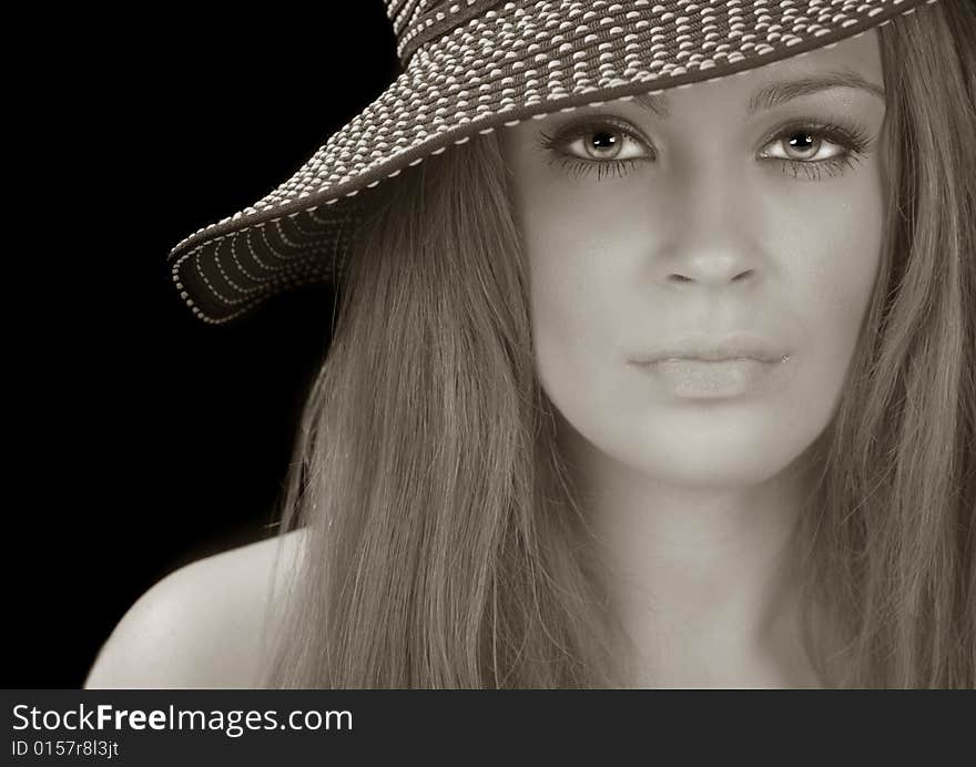 Beautiful image of a Model with a Hat On Black. Beautiful image of a Model with a Hat On Black