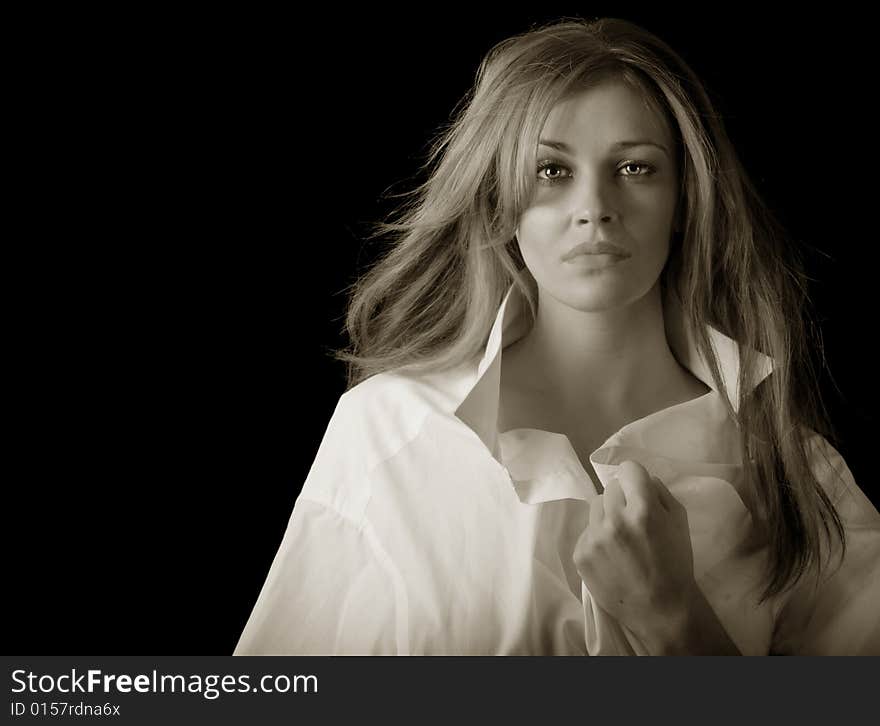 Beautiful Image of a woman in mans shirt