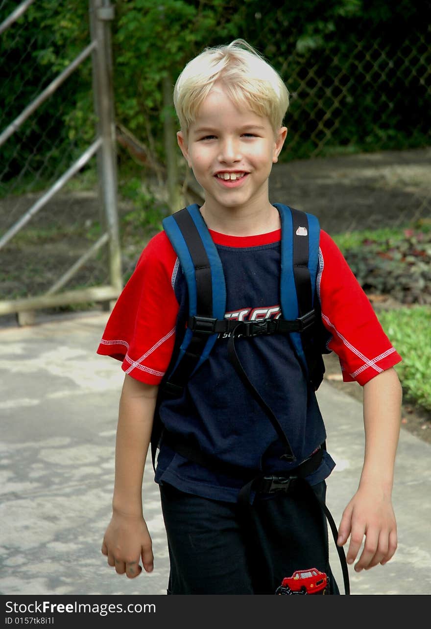 Boy Arrives Home From School