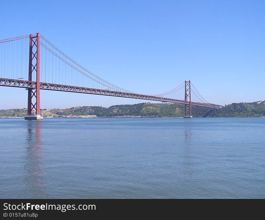 River Tagus under Lisbon's Bridge - Ponte 25 de Abril. River Tagus under Lisbon's Bridge - Ponte 25 de Abril