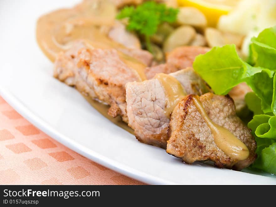 Tenderloin steak with mushroom creme sauce