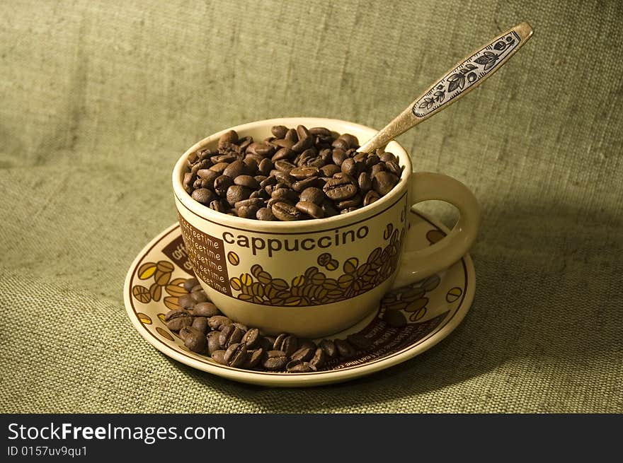 Coffee beans in the cup