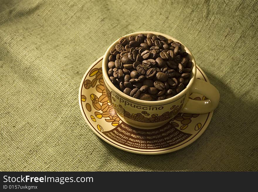 Coffee beans in the cup