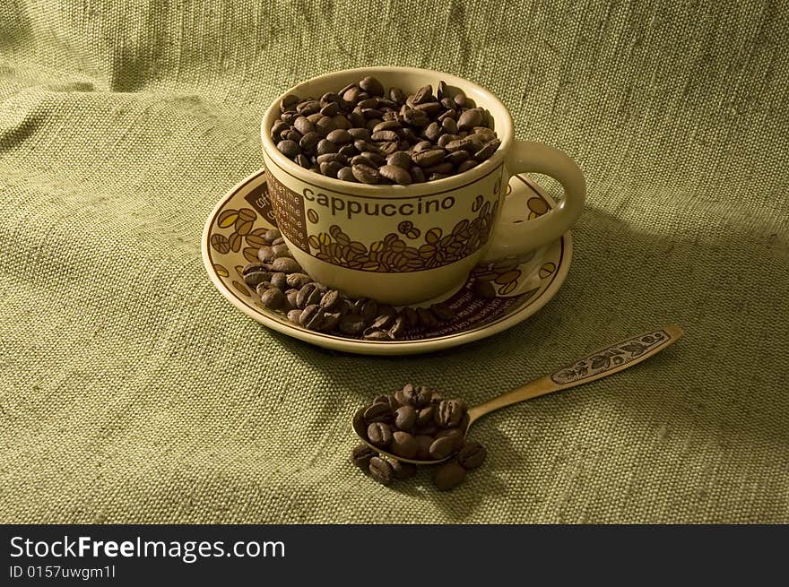 Coffee beans in the cup