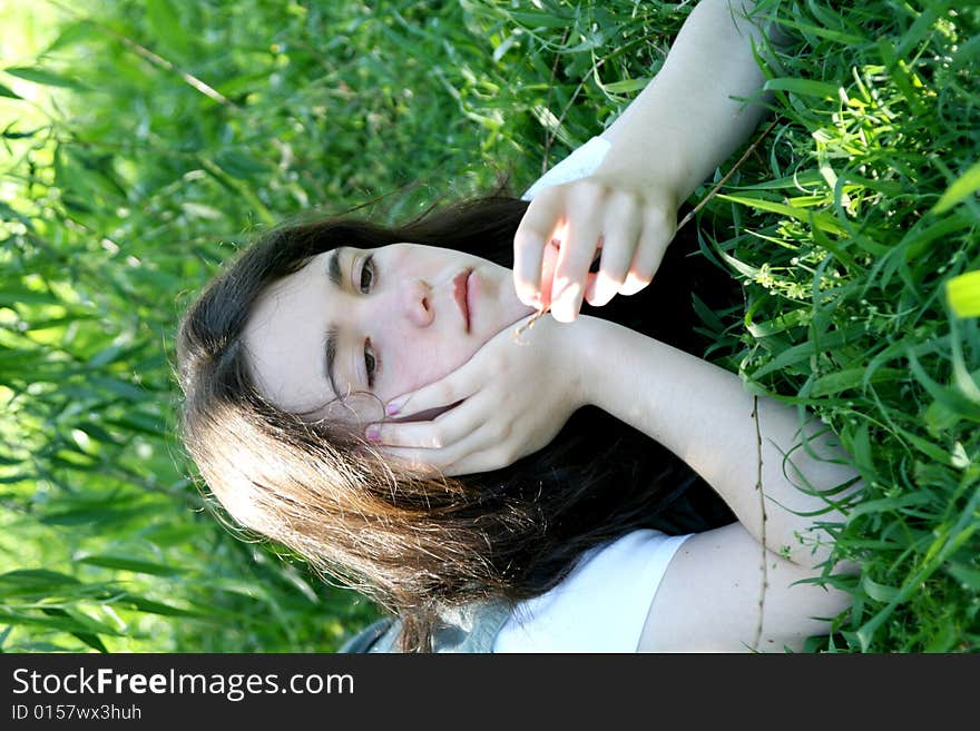 Teen Girl In Grass