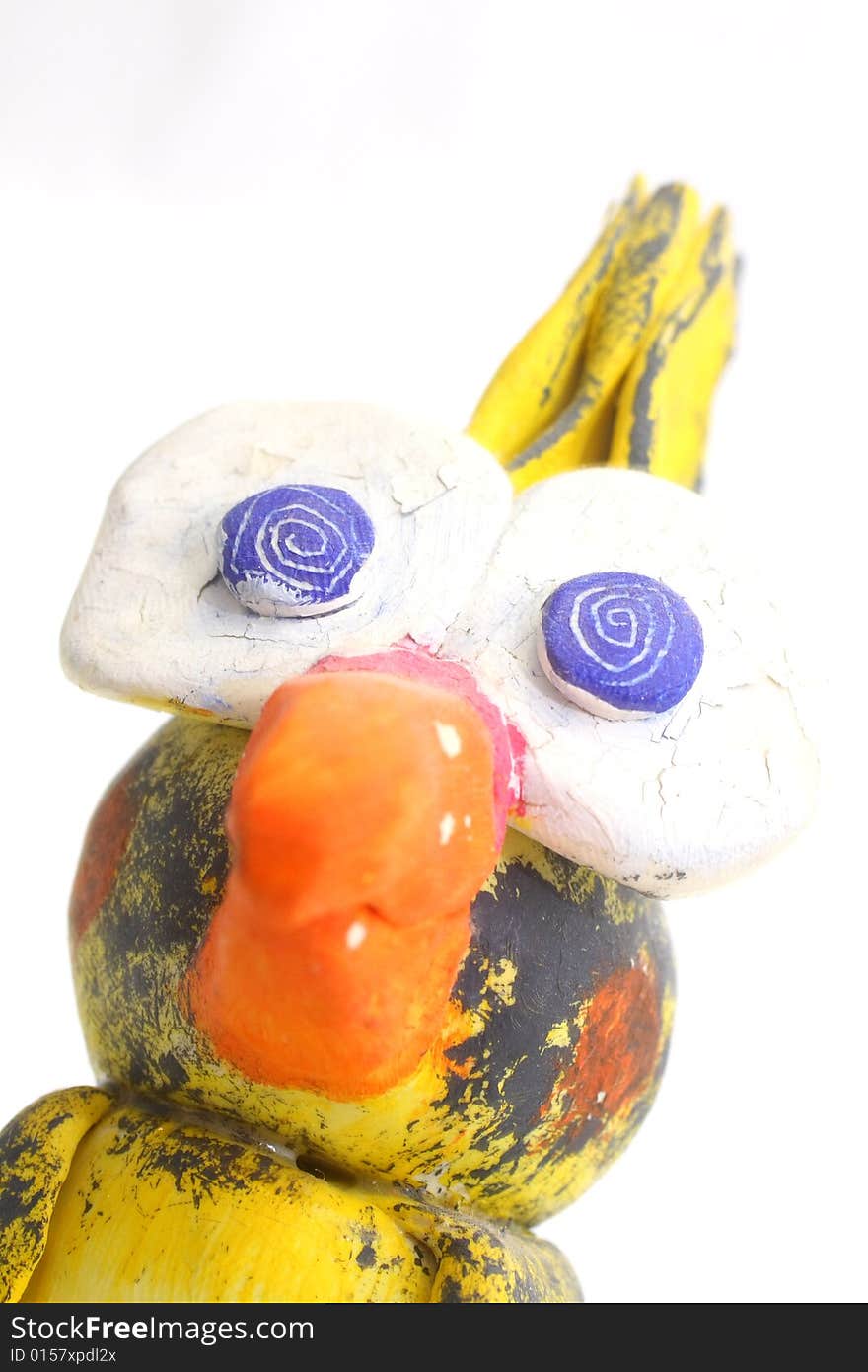 Hand painted clay Cockatiel Statuette in a cartoon style on white