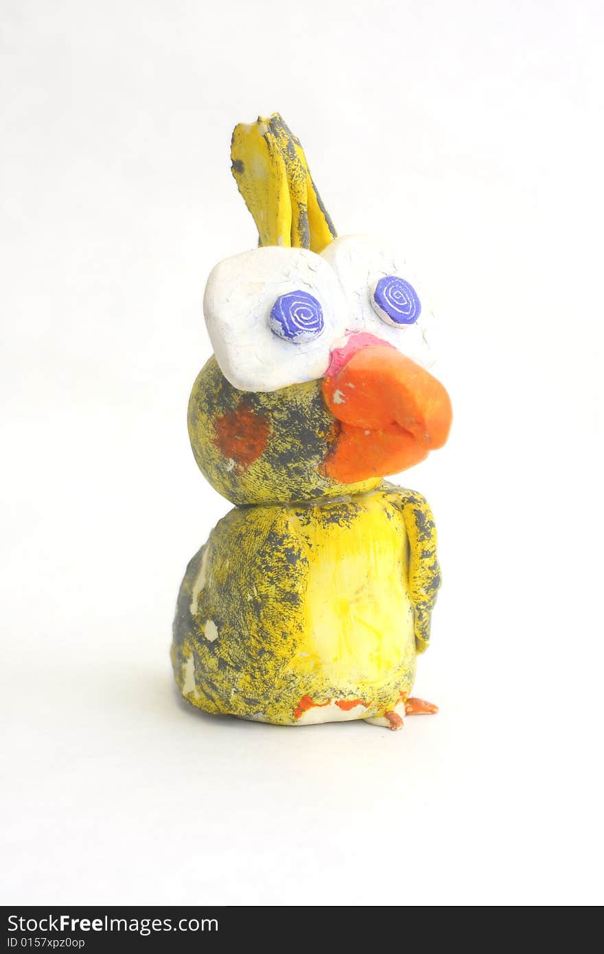 Hand painted clay Cockatiel Statuette in a cartoon style on white