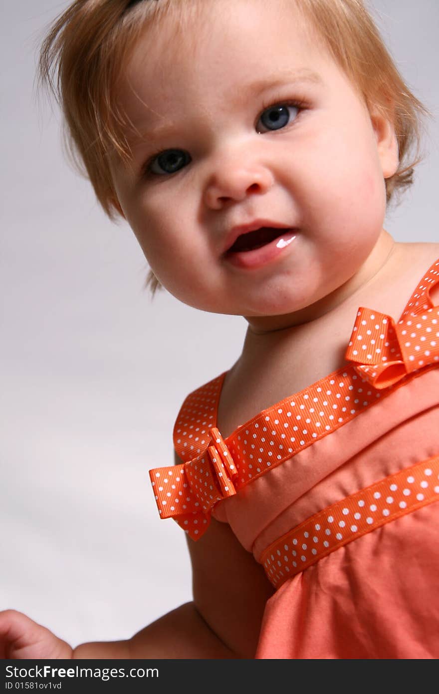 An angelic little baby girl takes a closer look. An angelic little baby girl takes a closer look.