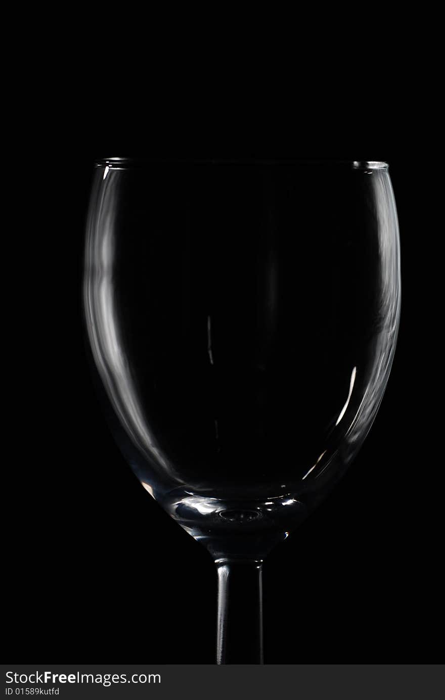 Drinking glass in black background