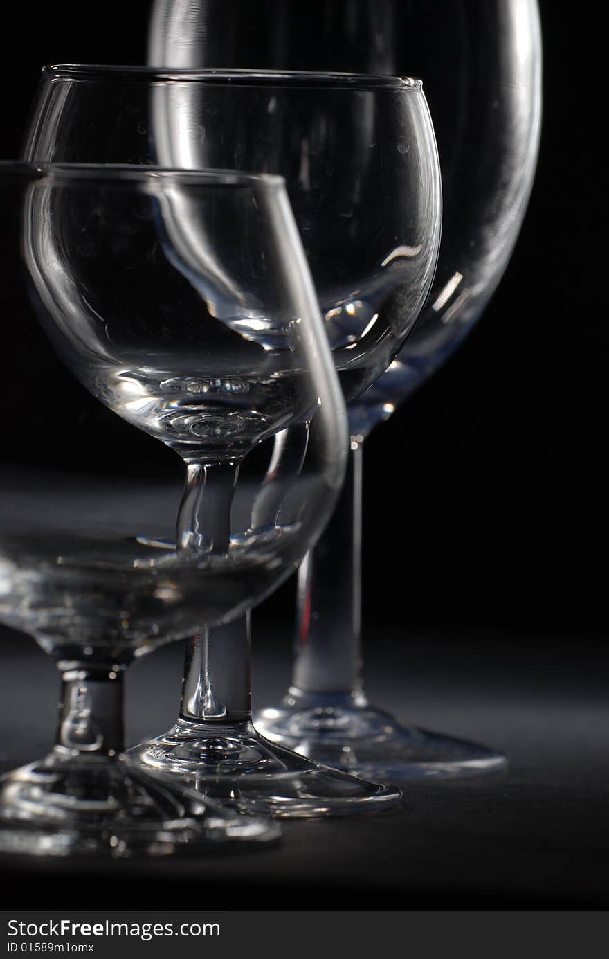 Drinking glass in black background