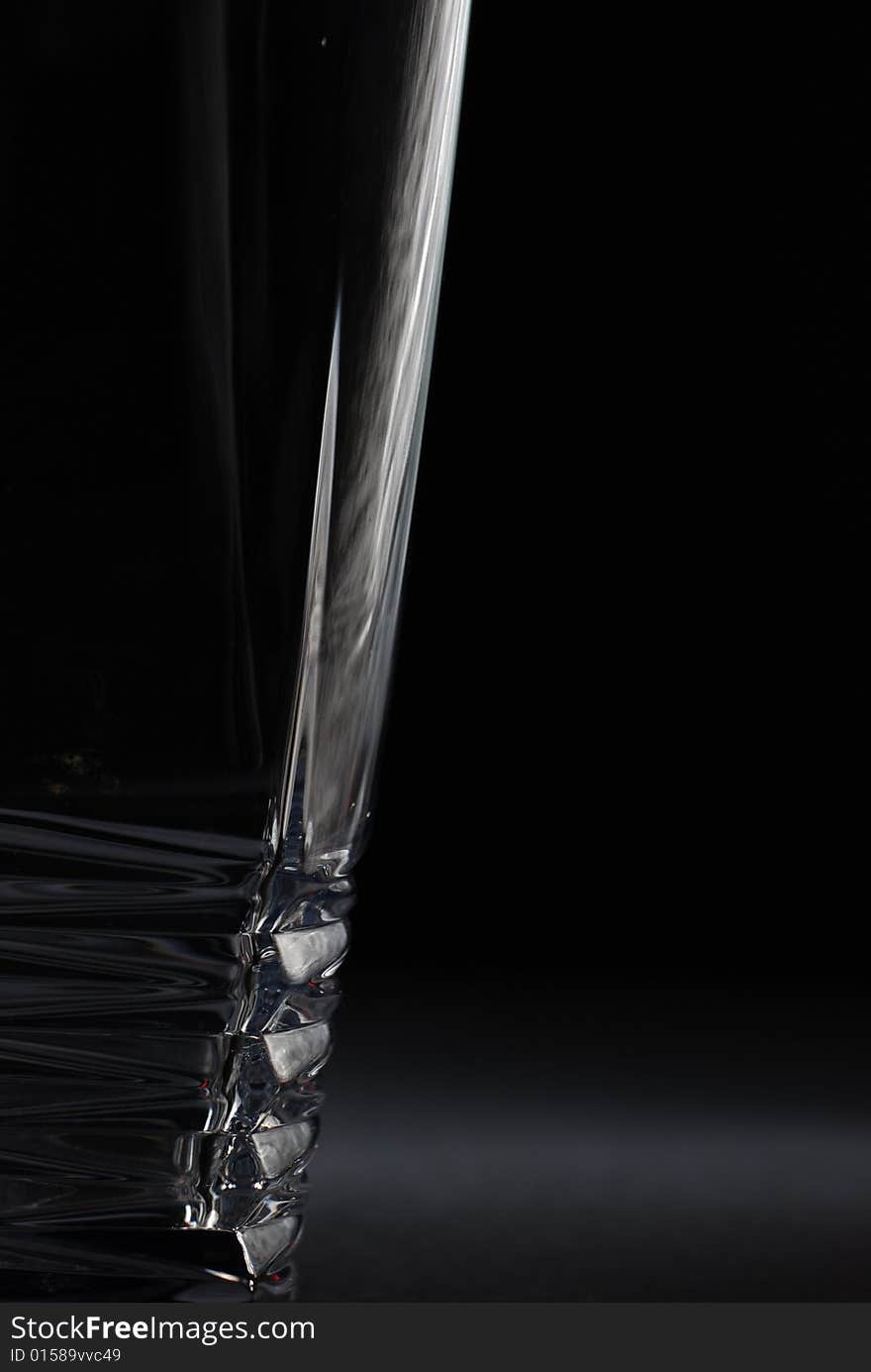 Drinking glass in black background