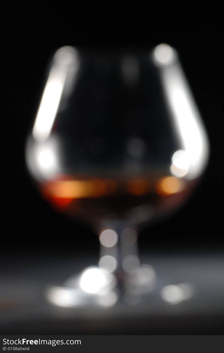 Drinking glass in black background