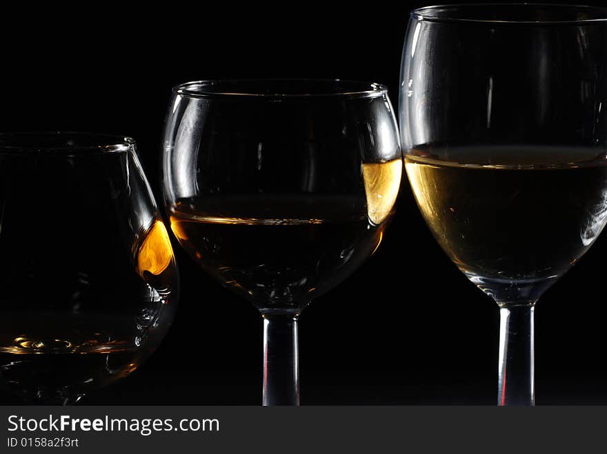 Drinking glass in black background