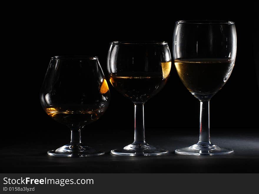 Drinking glass in black background