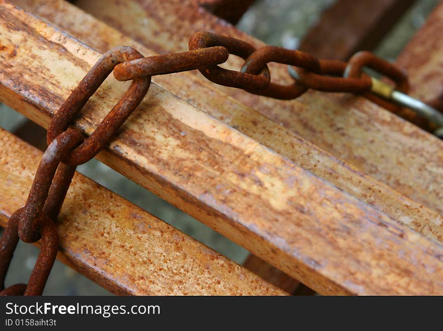 Rusty chain and a pile of rusty iron