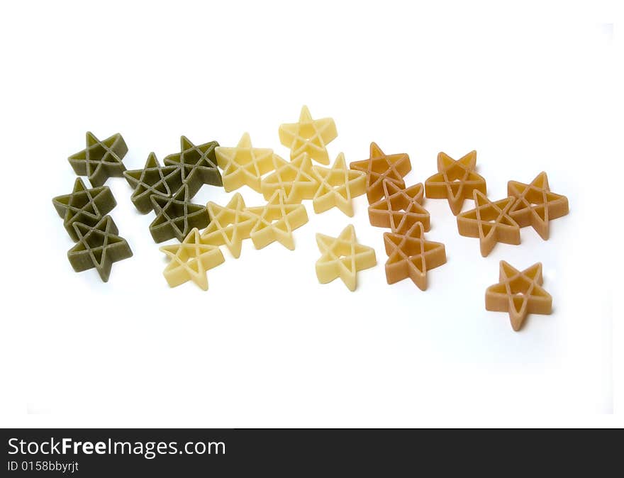 A small galaxy of stars made of pasta creating the italian flag. A small galaxy of stars made of pasta creating the italian flag