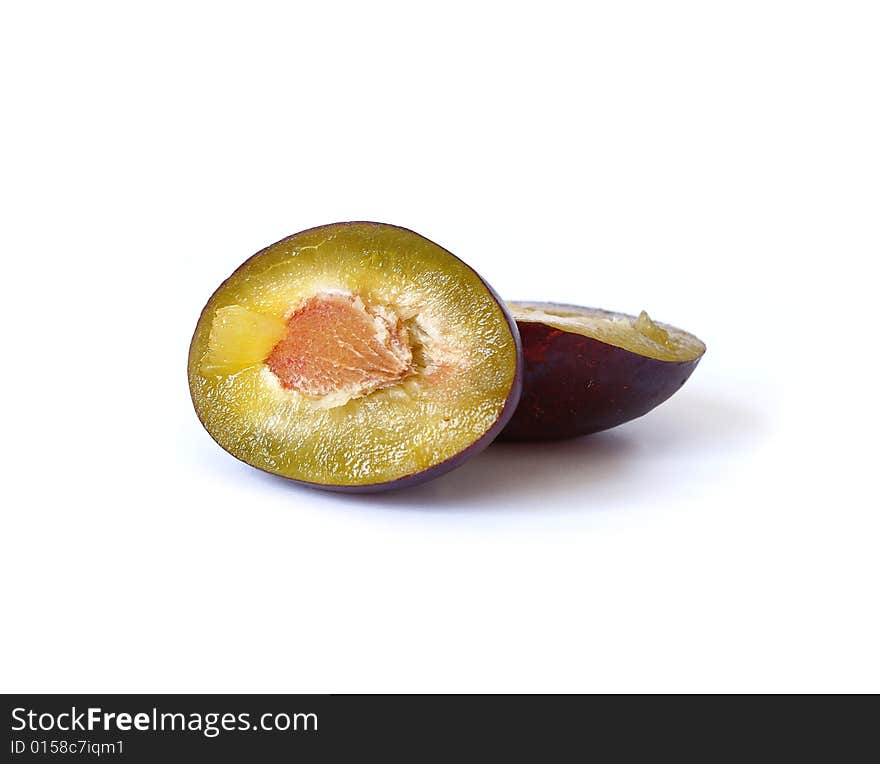 Ripe plums isolated on a white background. Ripe plums isolated on a white background