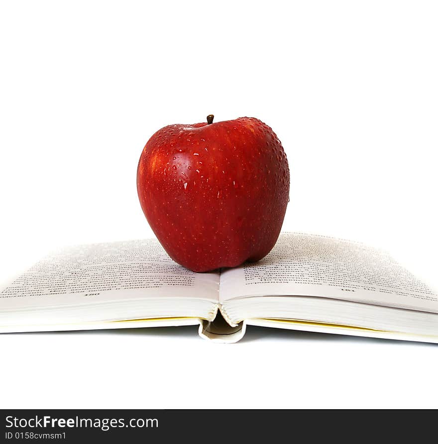 Red apple on the book