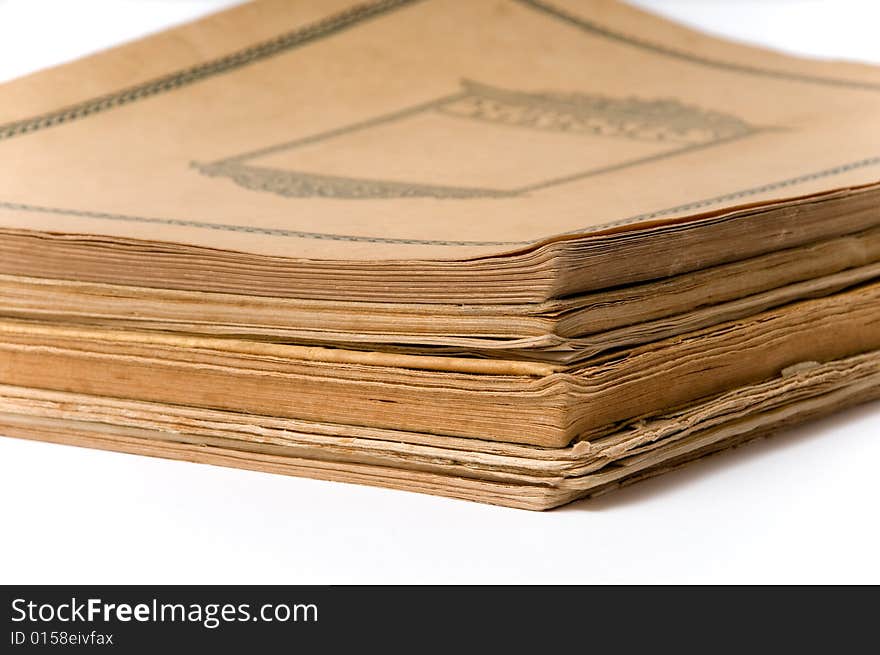 Antique text books isolated over white background