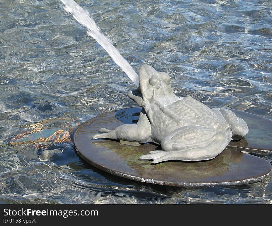 Frog fountain in a park