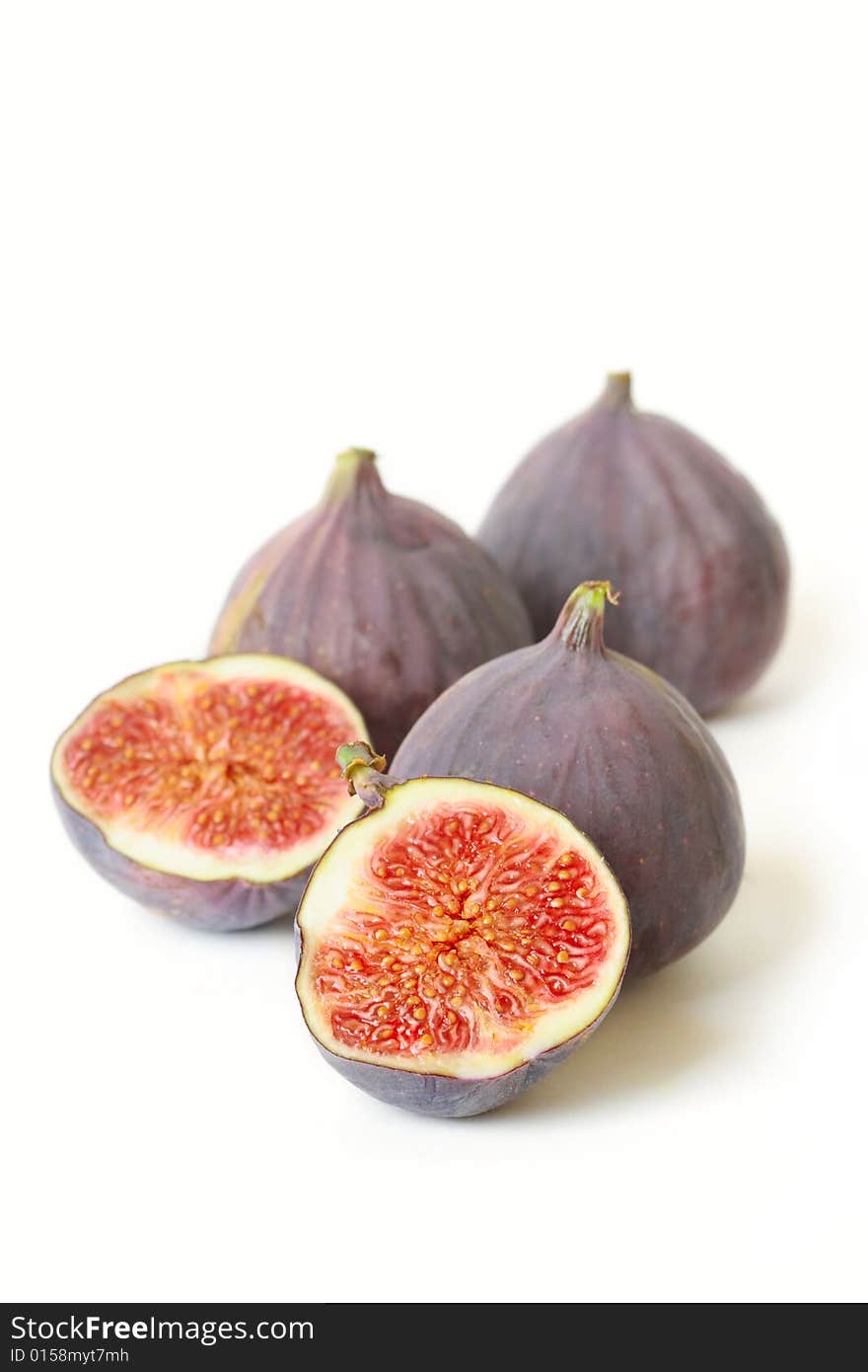 Closed-up of figs on white background