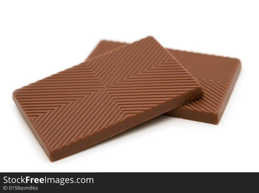 Milk chocolate on white background