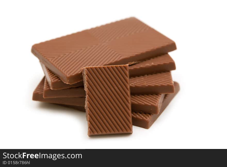 Milk chocolate on white background