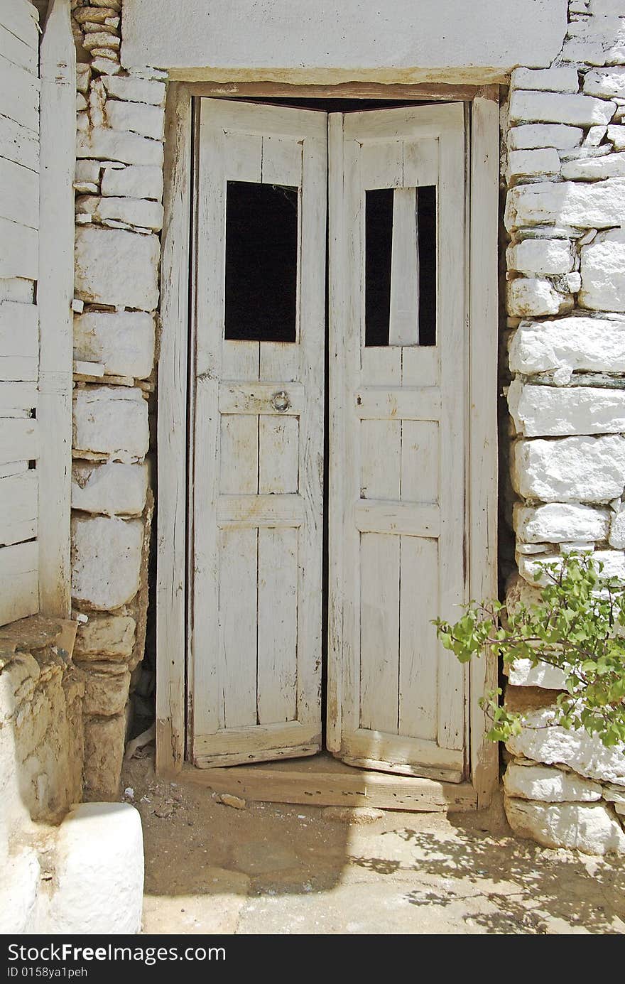 Old wooden door detail in Cyclades