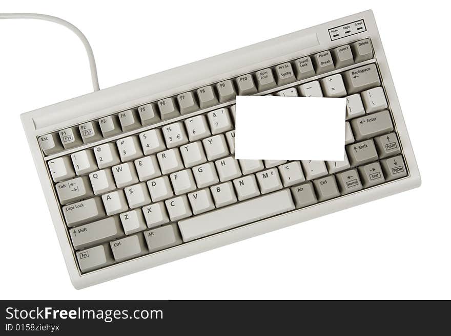 Computer keyboard and blank business card