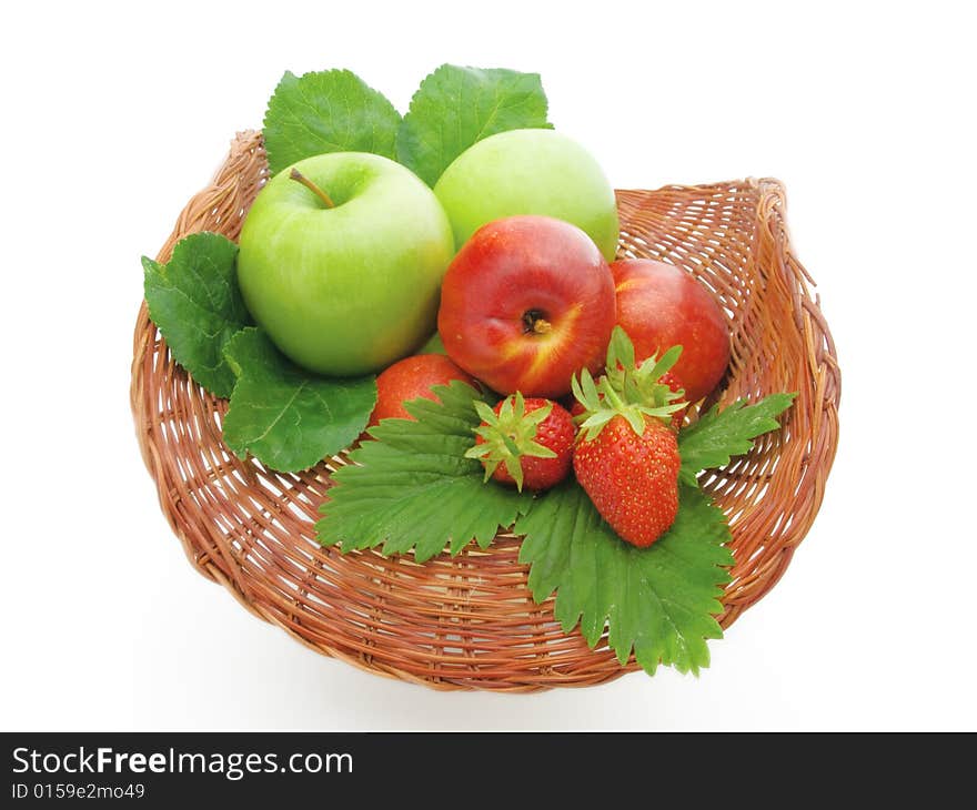 Fruit in a basket on a white background.