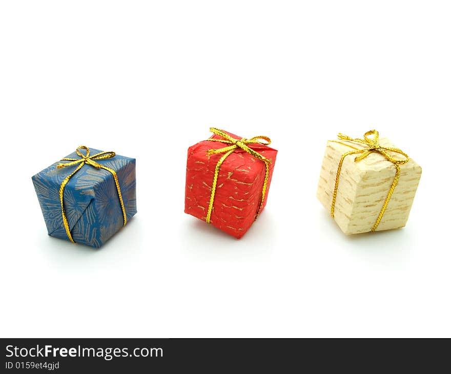 Three colour gift boxes isolated