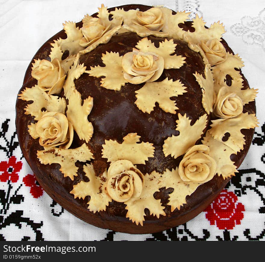 Traditional celebratory Ukrainian loaf decorated with roses from the dough