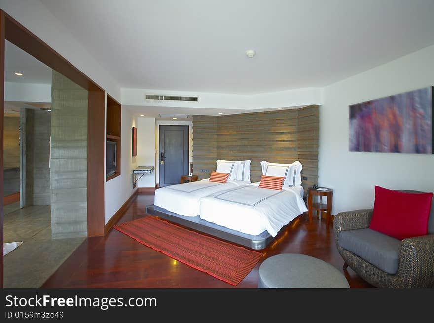 Panoramic view of nice light stylish bedroom. Images on wall was contorted. Panoramic view of nice light stylish bedroom. Images on wall was contorted