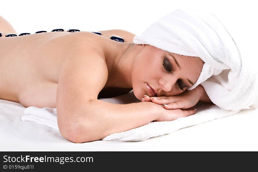 Young Lady Getting Massage With Hot Stones