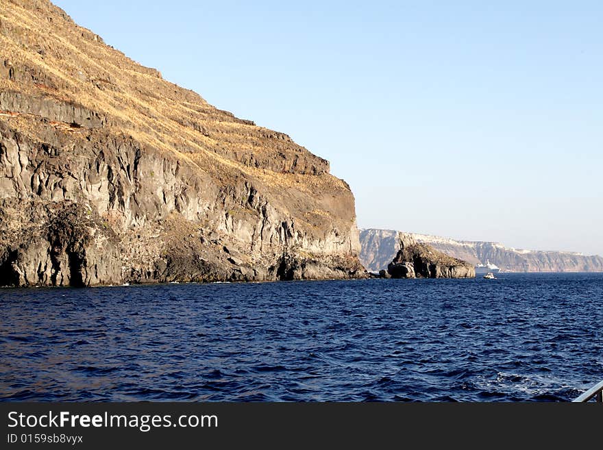 Cliffs and blue see at Greek shores